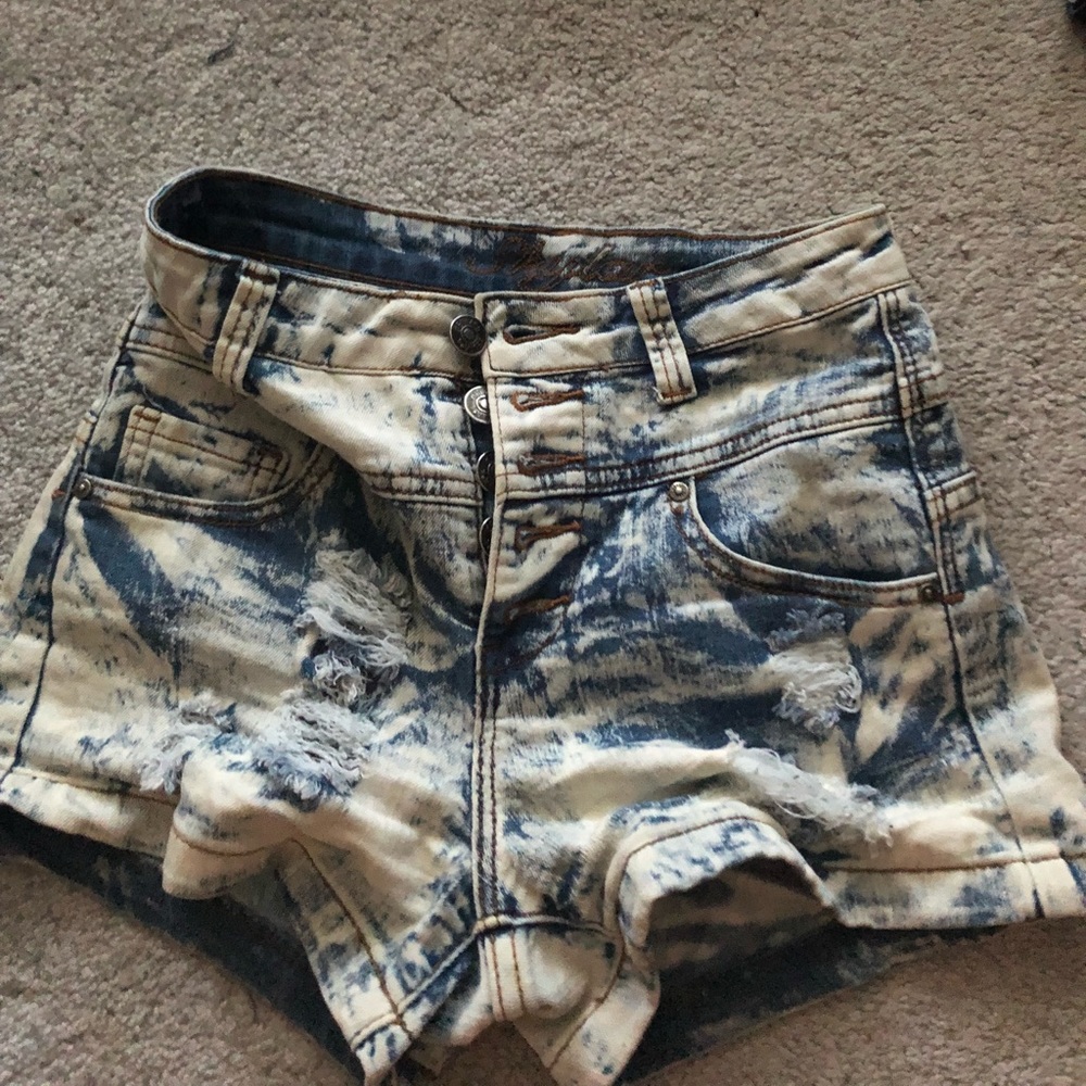 High-rise distressed button up shorts